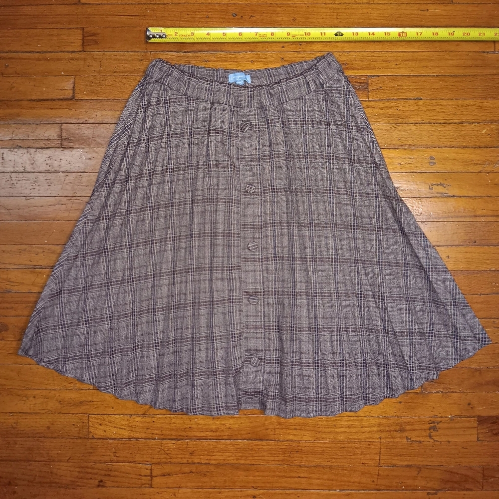 Pompomme pleated skirt